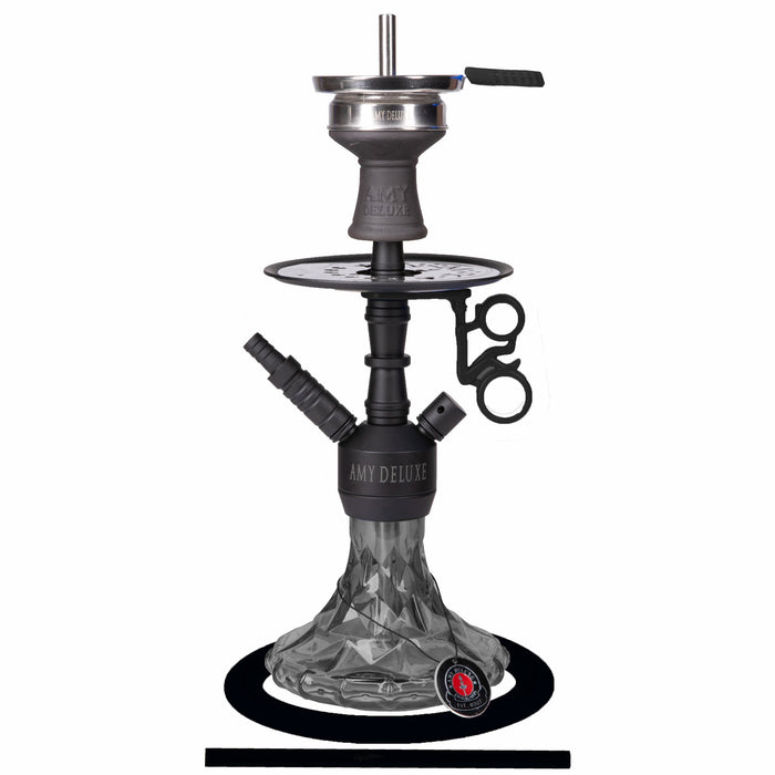 Amy Deluxe hookahs in the showroom, lined up from small travel model to shoulder height.