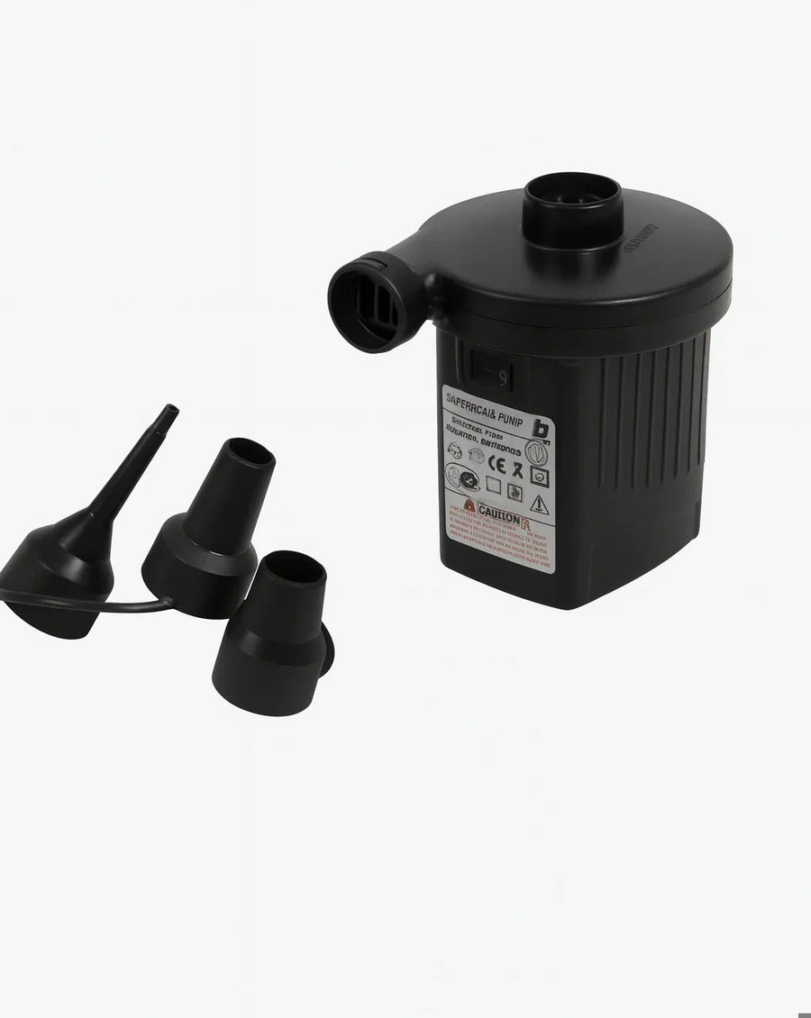 Black electric air pump with a blow opening on top and a side port, with three separate nozzle attachments beside it.